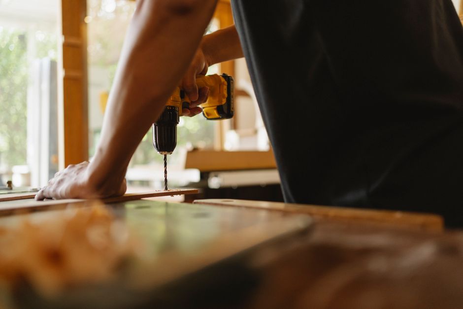 Carpenter installing custom kitchen elements